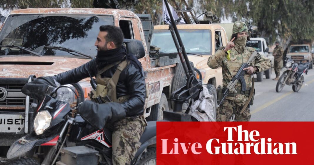 Syrian government forces withdraw from key city of Homs as rebels advance | Middle East and north Africa