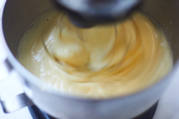 popover batter being mixed by an electric mixer