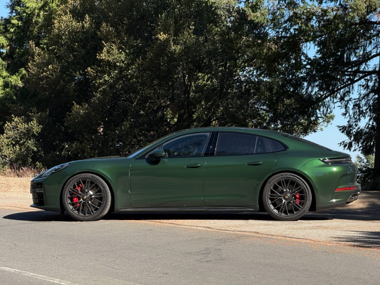 Side view of a green 2025 Porsche Panamera GTS