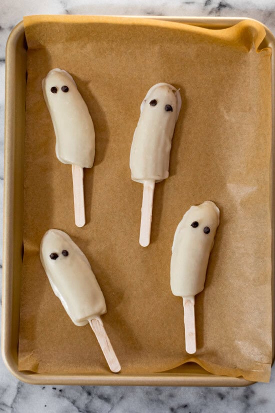 When frozen dip in melted white chocolate and add chocolate chips for eyes.